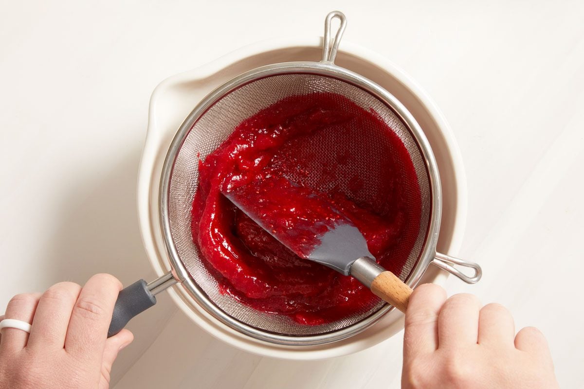 Send mixture through a fine mesh sieve; discard solids.